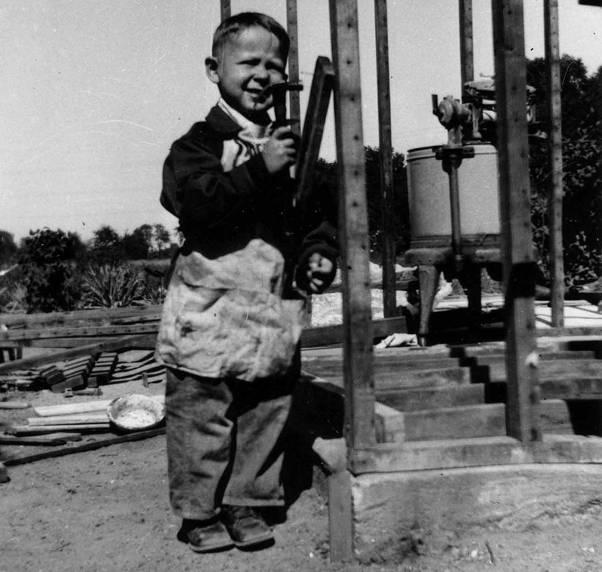 Small boy with a hammer